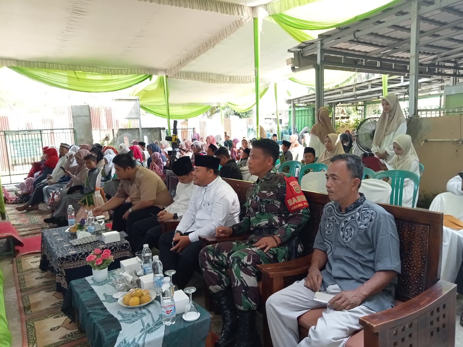 Babinsa Talang Jambe Hadiri Wisuda Tahfizh Al-Qur'an ke - IV 2024 , dan Peresmian Rumah Qur'an ATQIA 2