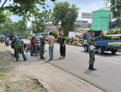 Kodim 0418/Palembang Gelar Jumat Berkah Bagikan Nasi Kotak Kepada Masyarakat Dan Anak Panti Asuhan