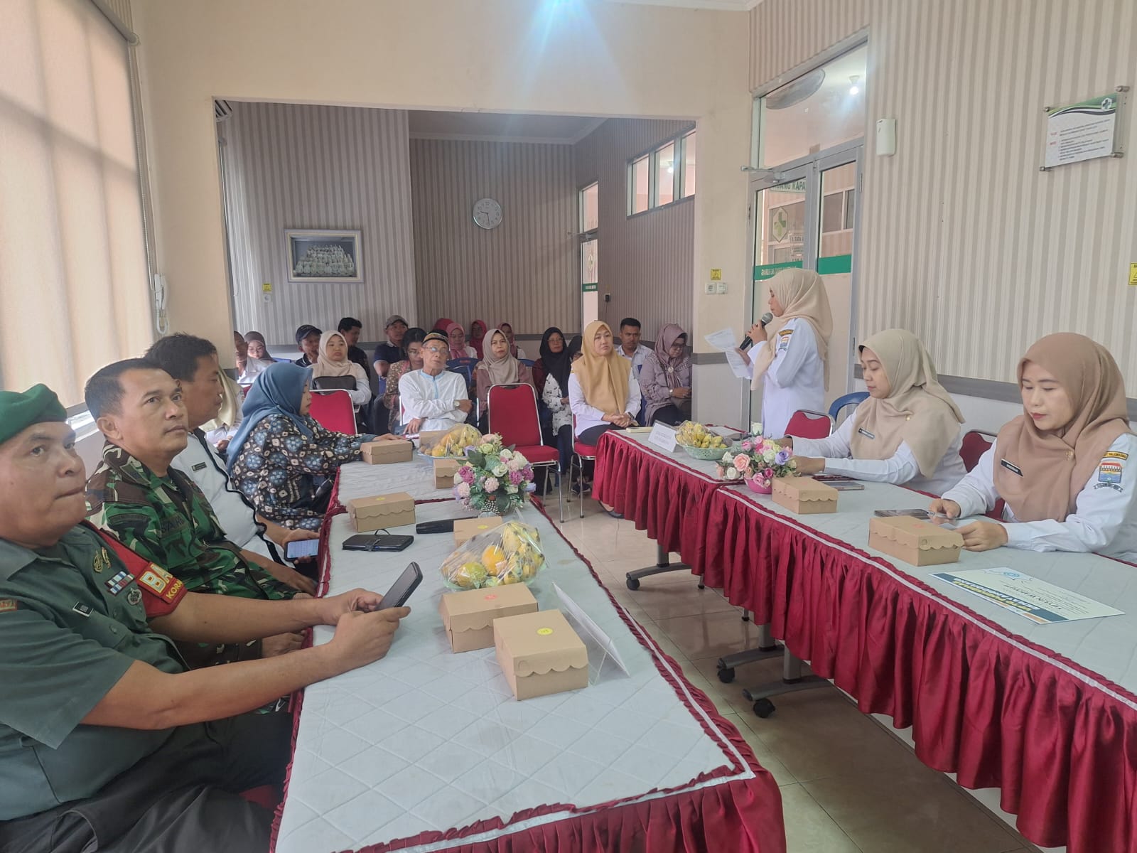 Babinsa Kelurahan Lebung Gajah Hadiri Rapat Mini Lokakarya Lintas Sektoral Triwulan IV di Puskesmas Sematang Borang 1