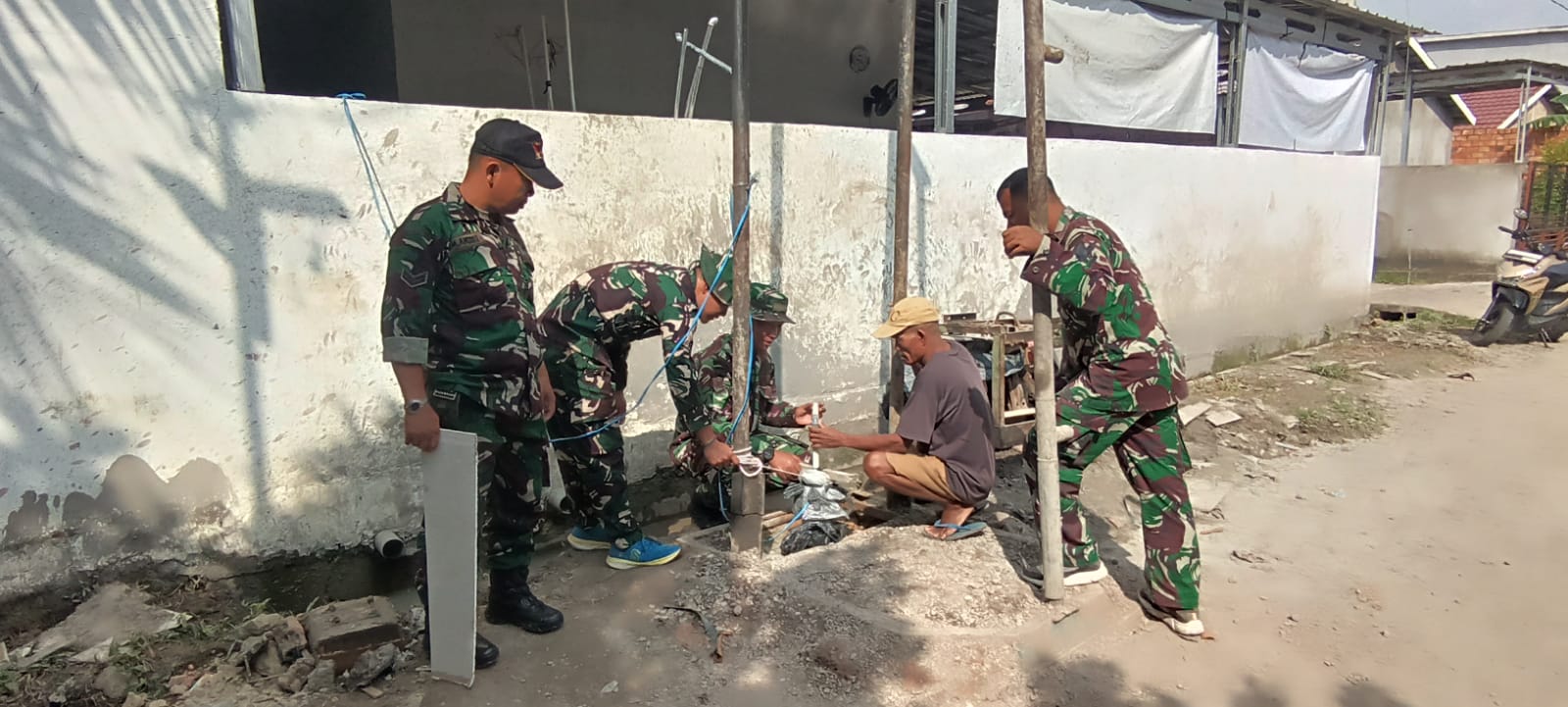 Setetes Air, Sejuta Harapan: TMMD Bangun Sumur Bor untuk Warga Talang Betutu 1