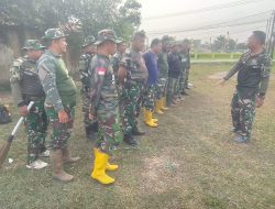 Menjelang Akhir TMMD, Satgas Bersama Anggota Kodim Mulai Bersihkan Area Persiapan Penutupan